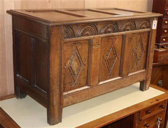 An 18th century and later oak coffer W.110cm